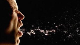 Man coughing