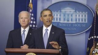 President Barack Obama, with Vice-President Joe Biden at his side, makes a statement regarding the passage of the fiscal cliff bill in the press briefing room at the White House in Washington, 1 January 2013