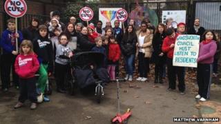 Children and protesters at the park