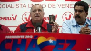 Diosdado Cabello (left) and Nicolas Maduro (right)