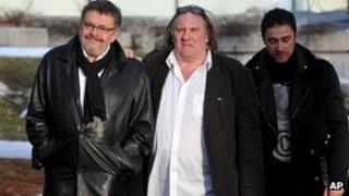 Actor Gerard Depardieu (centre) with Montenegrin Culture Minister Branislav Micunovic (L)