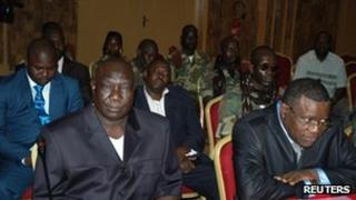 Lead rebel negotiator, Michel Am-Nondokro Djotodia (left), at peace talks in Gabon