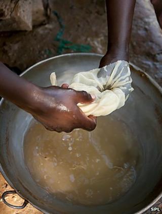 Miner using mercury to pan for gold (Image: Science Photo Library)