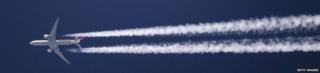 Plane passing over London