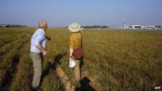 David Cundall (left) with Wargaming's Tracy Spaight at site of dig in Rangoon airport on 9/1/13