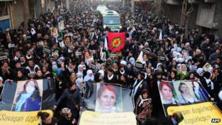 Thousands of people mark the funerals of the three Kurdish activists in the Turkish city of Diyarbakir