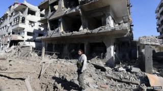 Rebel fighter in Mleiha district of Damascus (21 January 2013)