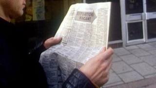 Man reading situations vacant