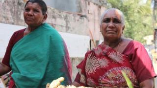 Two women vendors