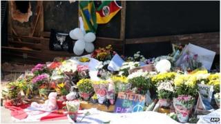 Flowers left in front of the Kiss nightclub in Santa Maria, southern Brazil
