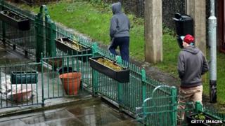 Young men on a rainy estate