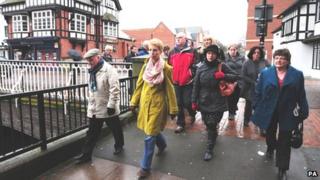Family members on the way to the meeting in Stafford