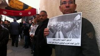 Tunisians gather for Friday's funeral, 7 February