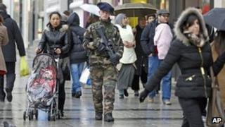 A French soldier patrols a street in Paris, 15 January