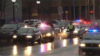 Police cars outside a courthouse in Wilmington, Delaware 11 February 2013