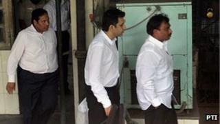 Sanjay Chandra (middle)