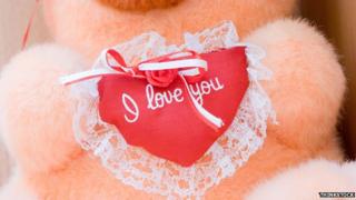 Teddy holding heart