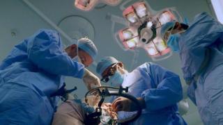 Surgeons in theatre