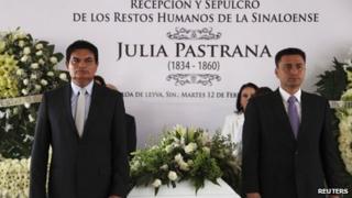 Mourners stand by the coffin of Julia Pastrana in Sinaloa de Leyva