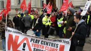Protesters with flags and banners outside Southampton Civic Centre