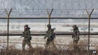 South Korean soldiers patrol the DMZ on 14 February 2013