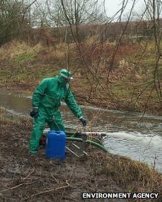 Environment Agency officer dealing with a pollution incident in Newport, Shropshire