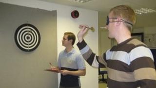 Dart throwing while blind, no concerns there