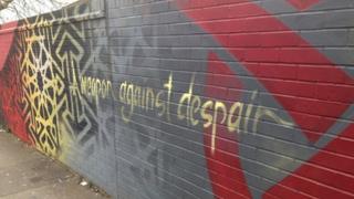 A mural on the side of the Sparkbrook Neighbourhood Forum office