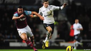 Tottenham Hotspur player Gareth Bale kicking football
