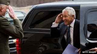 Secretary of Defense Chuck Hagel is greeted by USMC Lt General Thomas Waldheuser, who will serve as Hagels Senior Private Military Assistant, as he arrives for his first day at the Department of Defense, on 27 February 2013 in Arlington, Virginia