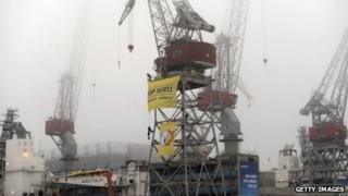 Greenpeace activists protest at the port of Helsinki against Shell's activities in the Arctic