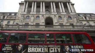 Bus outside Bank of England bearing Broken City film ad