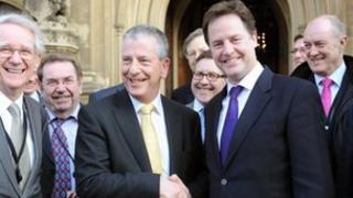 Mike Thornton MP (left centre) with Deputy Prime Minister Nick Clegg outside the Houses of Parliament, Westminster, after his recent victory in the Eastleigh by-election.