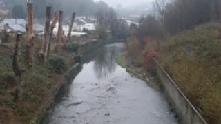 Stretch of the Rhondda Fawr discoloured by sewage