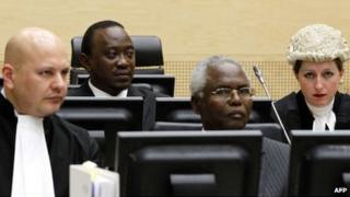 The winner of Kenya's presidential election Uhuru Kenyatta (2nd left) and ex-civil service chief Francis Muthaura (2nd right) attend a hearing at the International Criminal Court in The Hague on 8 Apri 2011