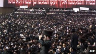 Satmar ultra-Orthodox Jewish men congregate in Brooklyn in 2011