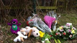 Flowers laid at the scene of where the baby was found