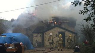 Thatched roof fire