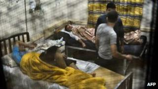 Egyptian students from the al-Azhar University rest in a hospital in Cairo.