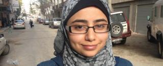 Portrait of Rawan Yaghi, 19 year old Gazan student who is wearing head scarf.