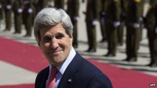US Secretary of State John Kerry arrives prior to an official arrival ceremony by Palestinian President Mahmoud Abbas in Ramallah 21 March 2013