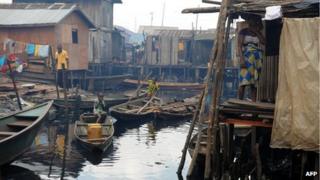 Children on boats in a shanty town in Lagos (30 August 2012)