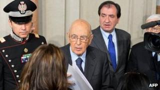 President Giorgio Napolitano (centre) speaking to press - file pic