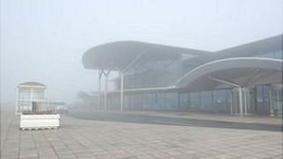 Guernsey Airport terminal in fog