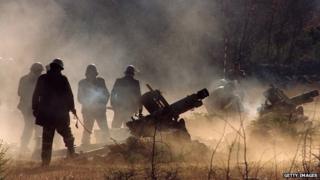 Serbian guns fire on Croatian targets during the 1991 conflict between Croatia and Serbs