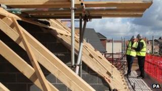 Builders at construction site