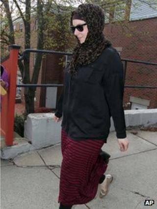 Katherine Russell, right, wife of Boston Marathon bomber suspect Tamerlan Tsarnaev, leaves the law office of DeLuca and Weizenbaum in Providence, Rhode Island 29 April 2013