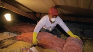 loft insulation being installed