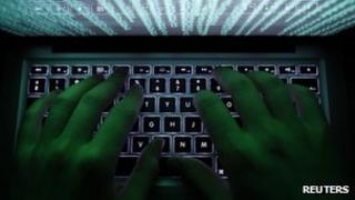 File photo: person typing on computer keyboard