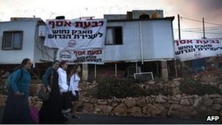 Settlers in Givat Asaf, northeast of Ramallah, in October 2011.
